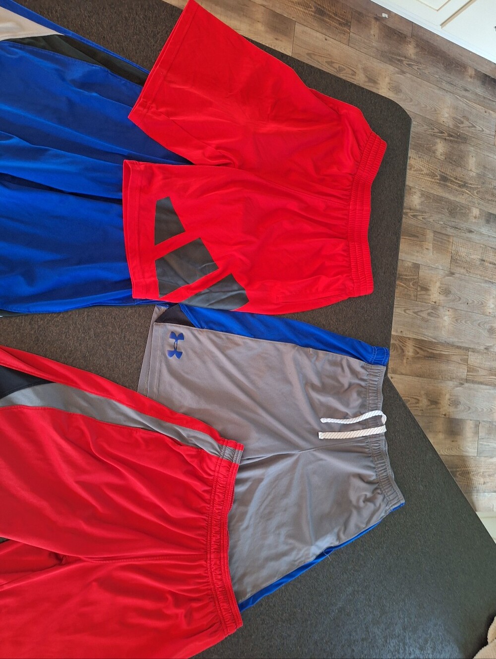 Under Armour Red Athletic Shorts with Black Logo